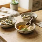 Natural full-color, warm daylight shot of diverse, unlabelled supplement capsules and natural powders